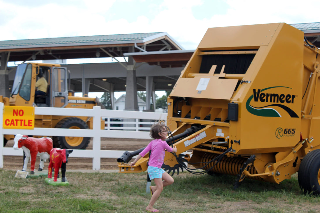 What size net wrap fits a Vermeer 605M baler — Vermeer round baler at the Iowa State Fair, representative of the Vermeer round baler product line