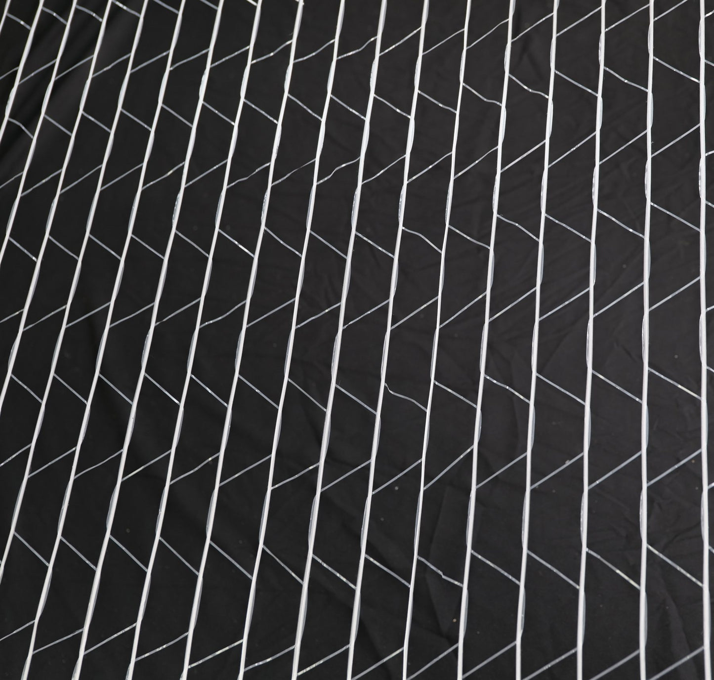 DualBond net wrap structure — two wide HDPE strands thermally bonded at every cross point